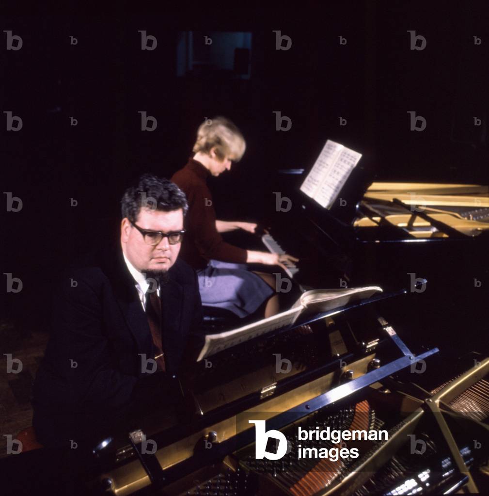 OGDON, John and his wife Brenda LUCAS playing piano, 1962 by D Farrell English pianist and composer b