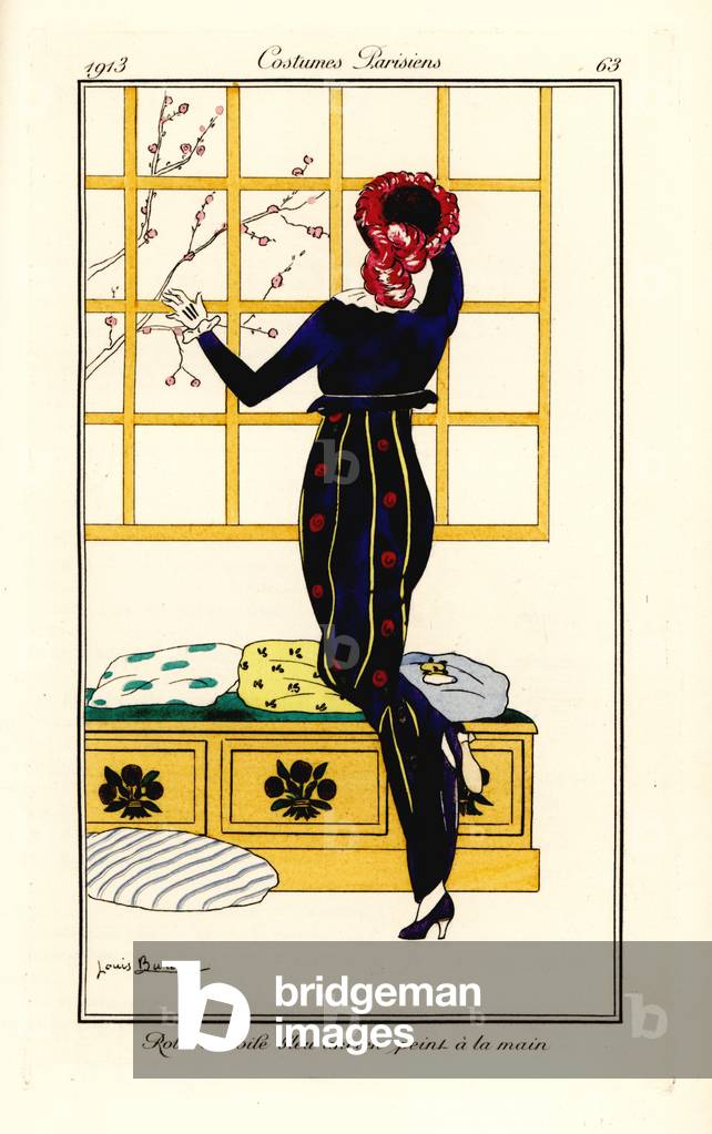 Woman in dress of hand-painted old-blue veil looking at cherry blossom out of a window, handcoloured pochoir (stencil) etching after an illustration by Louis Bureau from Tommaso Antongini’s Journal des Dames et des Modes, Aux Bureaux du Journal des Dames, Paris, 1913.
