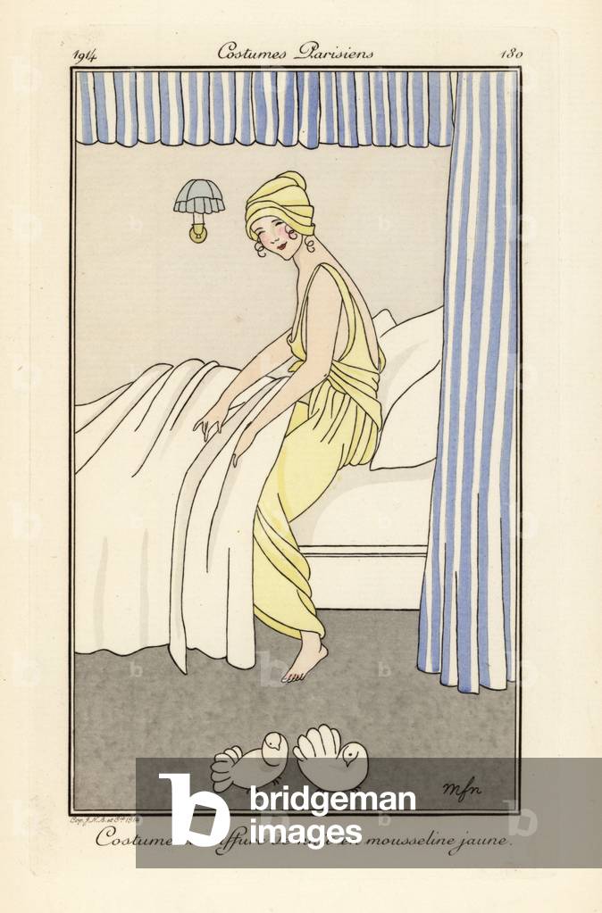 Woman in yellow chiffon night gown and hat getting into bed.