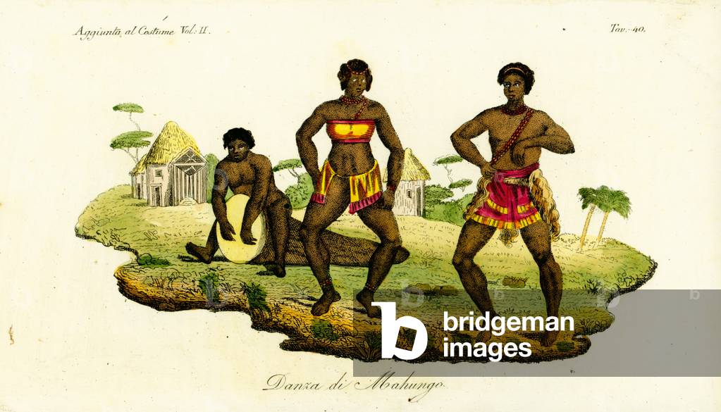 Two Mahungo women dancing the semba to music from a drum carved from a log in Angola