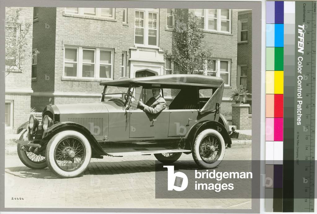 Howard (Howdy) Wilcox at the wheel of a Cole Aero-eight, 1921 (b/w photo)