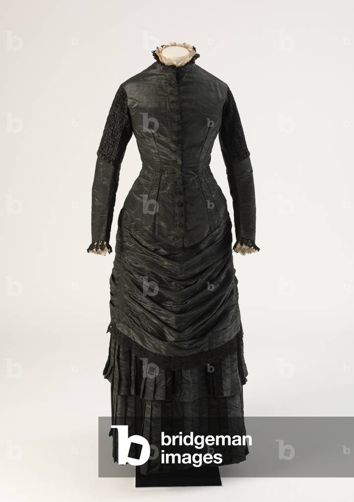 Black watered silk mourning dress, 1880s (silk)