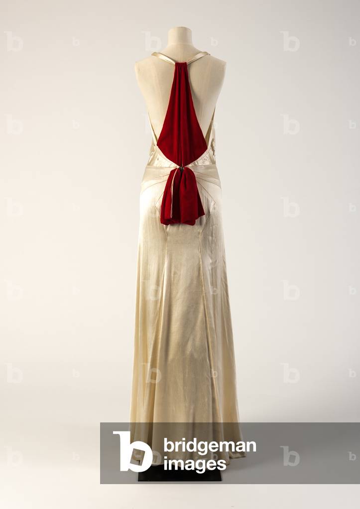 Ivory 'crinkle' weave synthetic evening gown with red velvet feature back, 1930s (synthetic fabric & velvet)