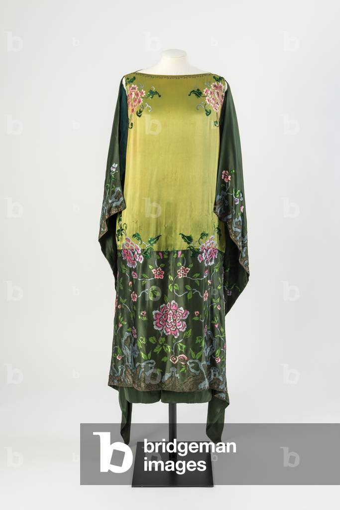 Green silk evening dress embroidered with floss silk and silver metal thread in a large floral and foliage design, c.1925 (silk)