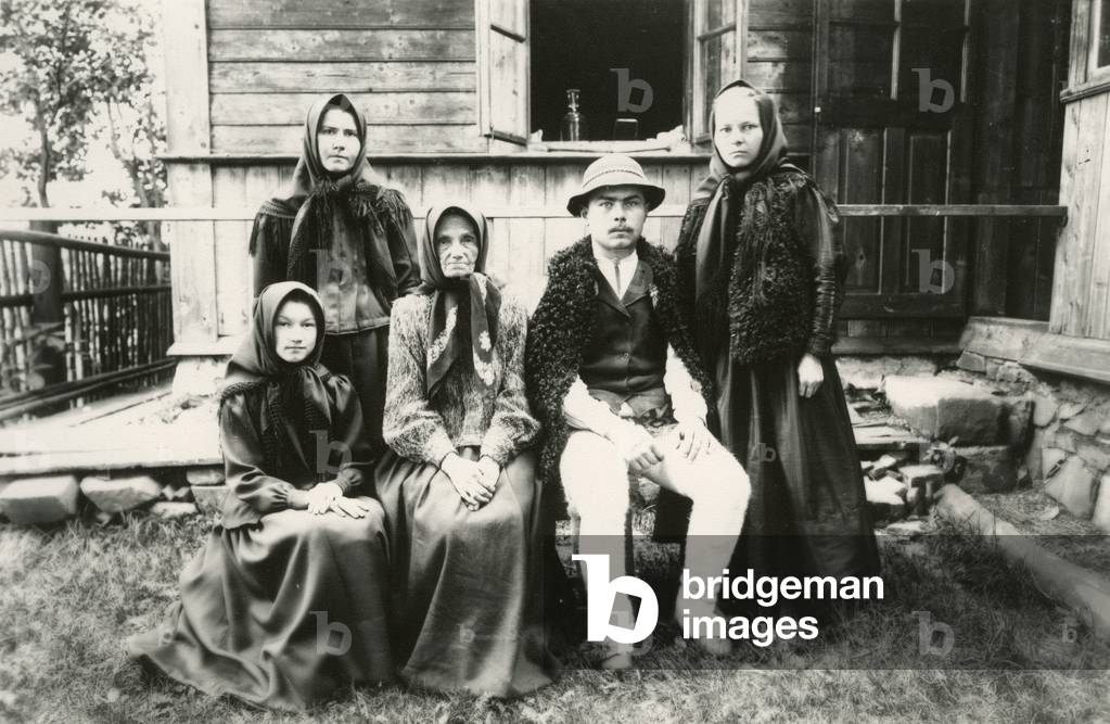 Vicinity of Lviv; inter-war Poland, nowadays Ukraine, 1920s; Hutsul family in front of their cottage in the village situated nearby Lviv. 