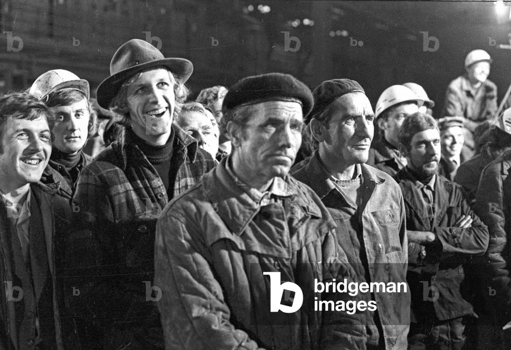 Ursus, Warsaw, Poland, 1978. Workers watching a theatrical play performed by Teatr Ochota actors in a workshop of the 'Ursus' Tractor Factory. 