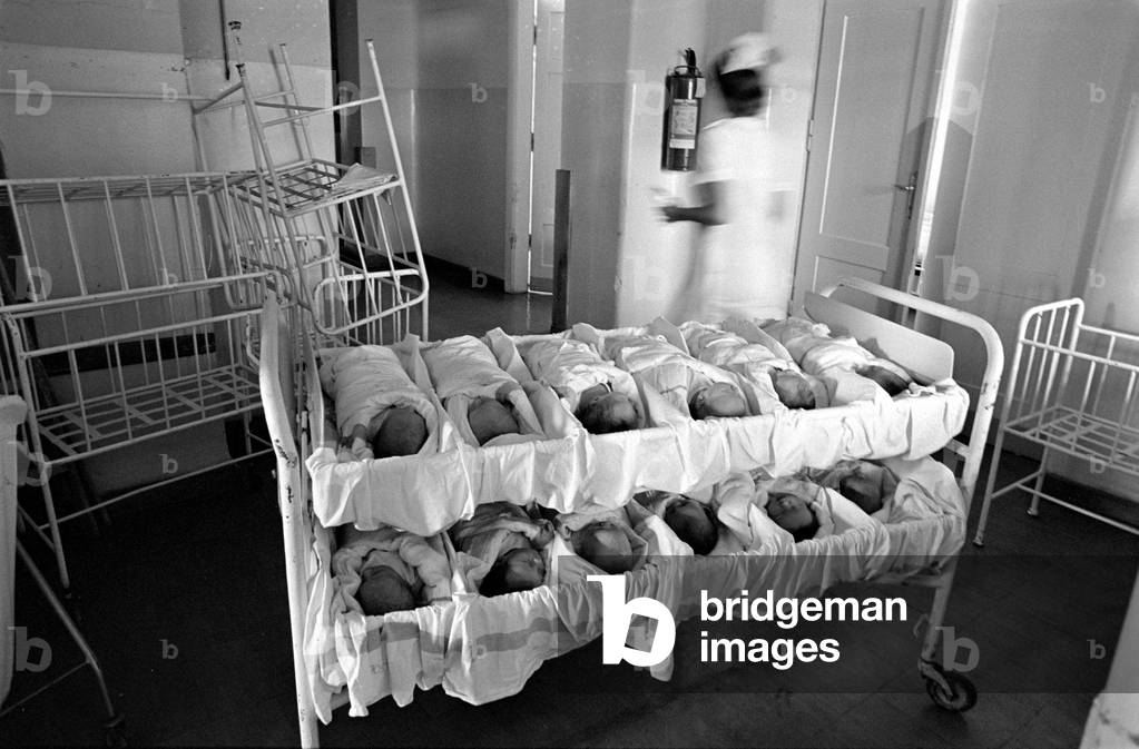 Warsaw, Poland, 1978. Babies lying in playpens at the maternity hospital on Karowa street. 
