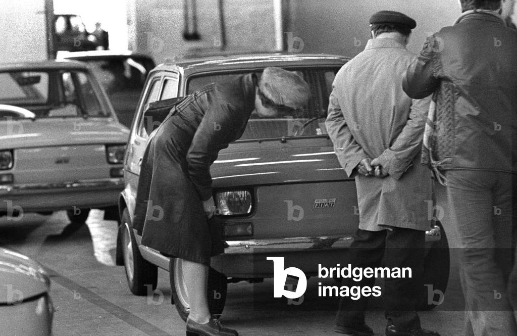 Warsaw, Poland, 11.1977. People in the Fiat car showroom. 