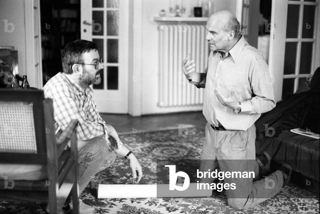 Warsaw, May 1990. Ryszard Kapuscinski and Martin Pollack, an interpreter translating his book from Polish to German. They're discussing the trips Ryszard took whilst working on his book 'Imperium'. 