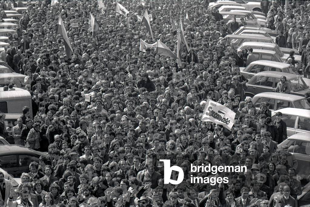 Warsaw 01.05.1982. Martial Law in Poland. Dluga street, unofficial beginning of 1st May Solidarity. Flag written, ' Solidarity'. 