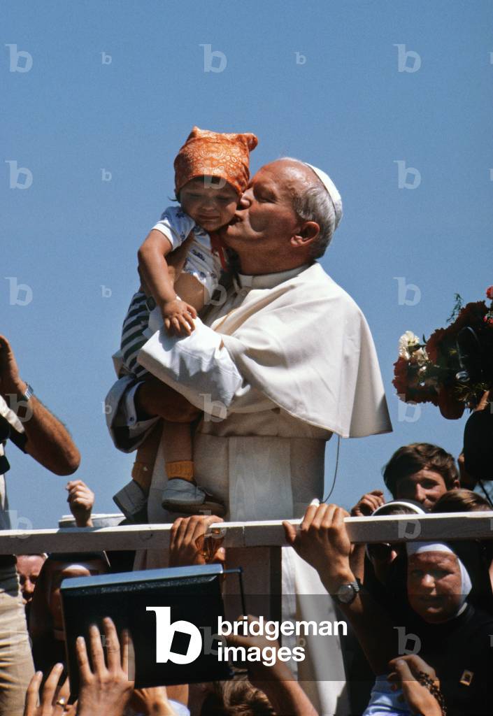Pope John Paul II kisses a one year-old girl at Jasna Gora monastery in Czestochowa, during his first pilgrimage to Poland in June 1979. 