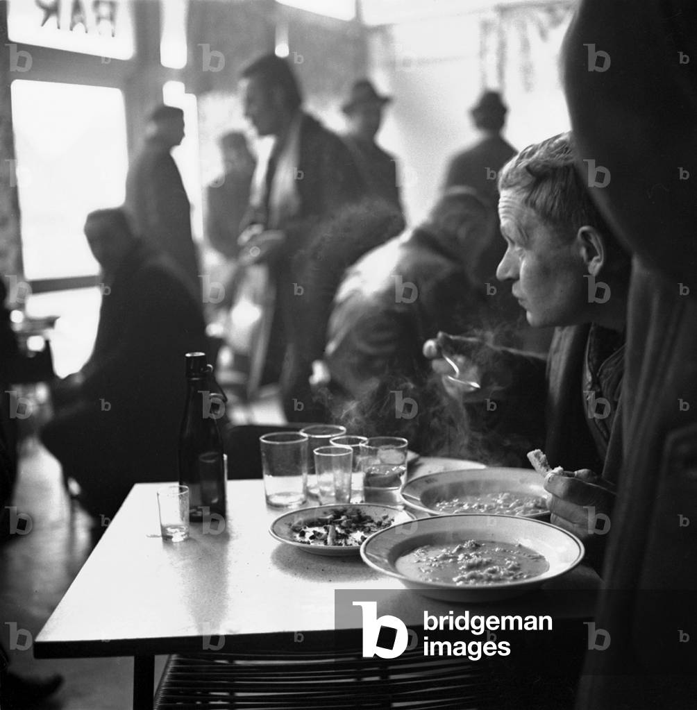 Bialystok, Poland, 02.1977. Man having soup in a restaurant. 
