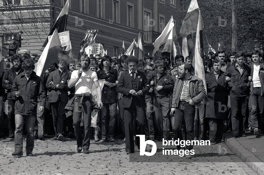 Warsaw 01.05.1982. Martial Law in Poland. Stara street, unofficial beginning of 1st Maj Solidarnosc. Pictured: banner written ' No to dictatorship'. T-shirt written, 'Solidarnosc'. 