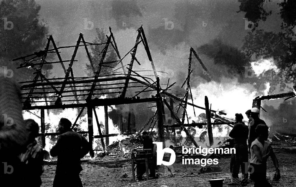 Masovian Voivodeship, Poland, 07.1970. Village on fire. 