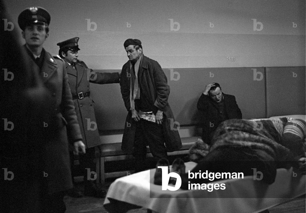 Warsaw, Poland, 1977. Drunken man brought to the drunk tank ( called 'day nursery' ) on Kolska street by Citizen's Militia patrol. 