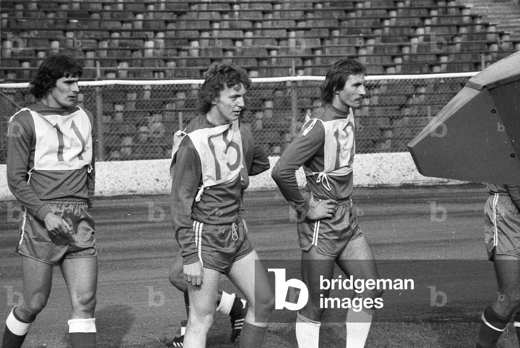 Chorzow Poland 1976. Polish national football team during a training session in Slaski Stadium ( Silesian Stadium ). From the left are: Pawel Janas, Zbigniew Boniek and Andrzej Szarmach. 