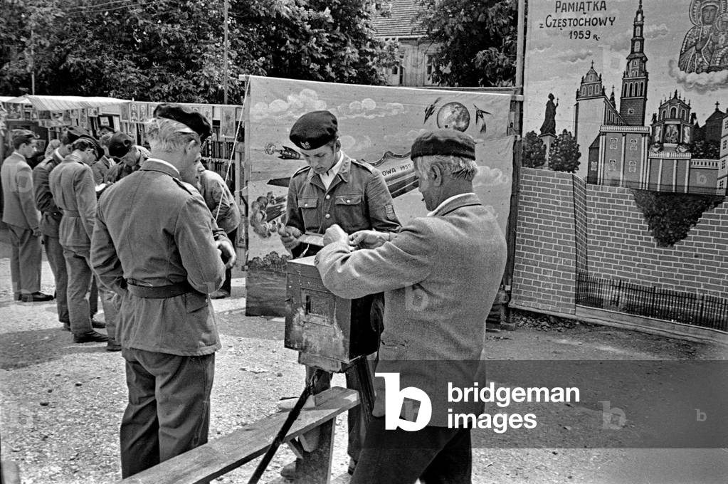 Czestochowa, 1959. Photographer taking a picture of the Pauline Monastery using a large format camera. 