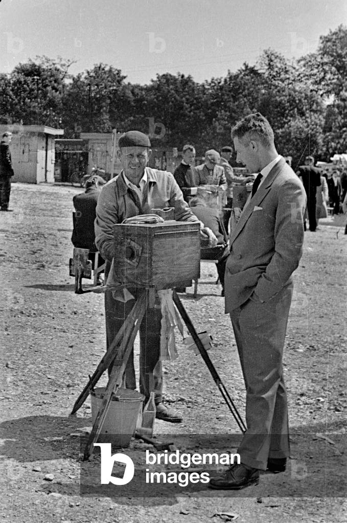 Czestochowa, 1959. Photographer taking a picture of the Pauline Monastery using a large fromat camera. 