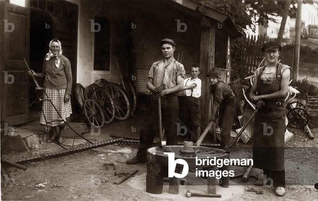 Kuznia, 1919. Horse cart wheel and other tools factory. 