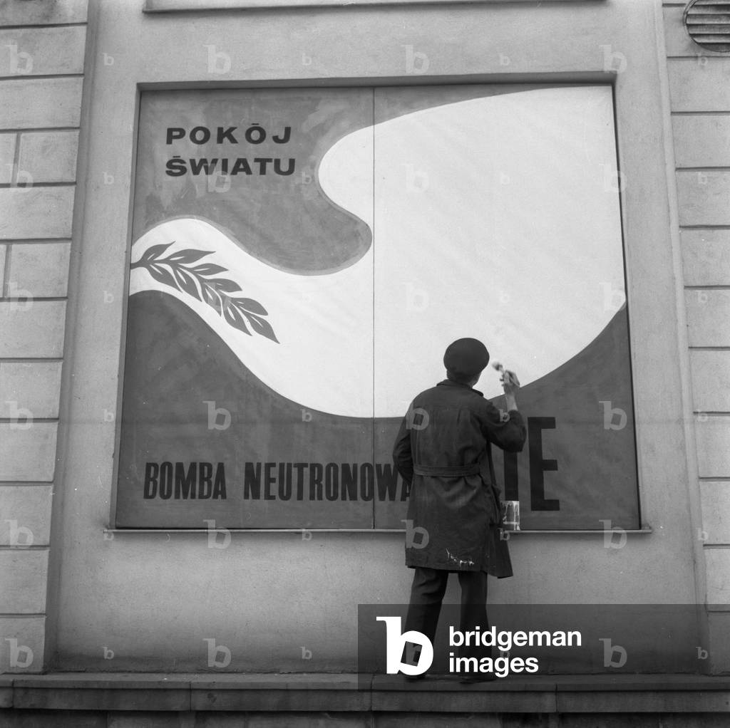 Lublin, Poland, 1978. Painted propaganda poster about 'fight for a peace'. Slogans on the poster read ' Peace for the World' and 'Say no to the neutron bomb'. 