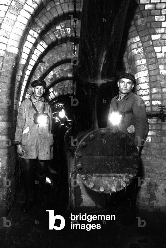 Warsaw, 1949. Udarnik or strike worker in the canals. 