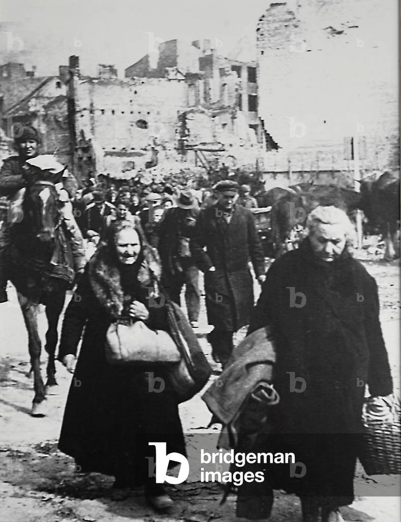 Refugees amongst the ruins of Gdansk Old Town in 1945. 
