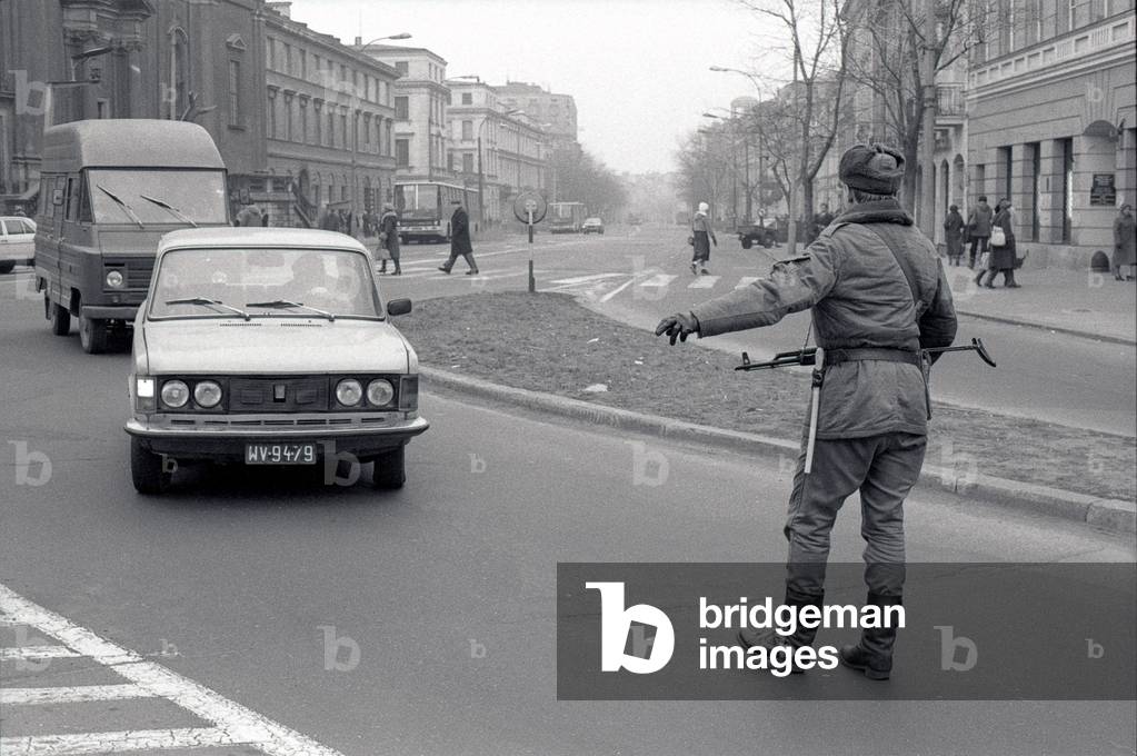 Warsaw March 1982. Krakowskie Przedmiescie street. Pictured: Car being pulled over for control check. 