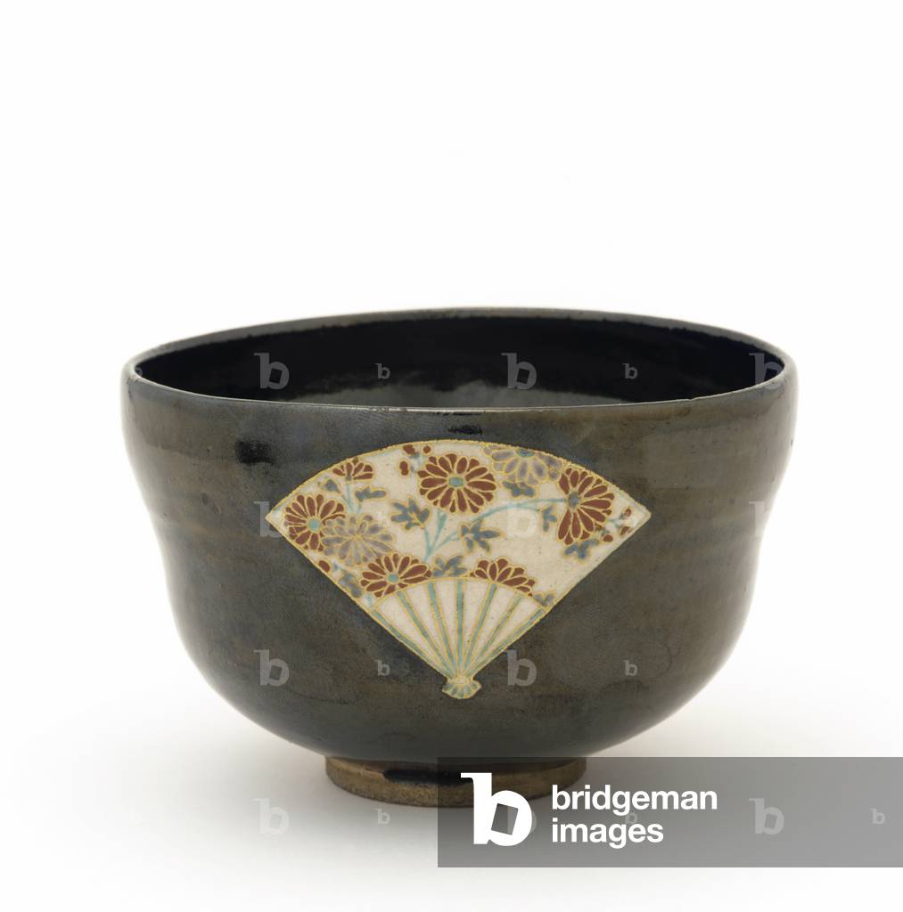 Tea bowl with reserve design of fans, Kyoto, Kyoto-fu, Edo period, mid-17th century (stoneware with black glaze and enamels over white glaze)