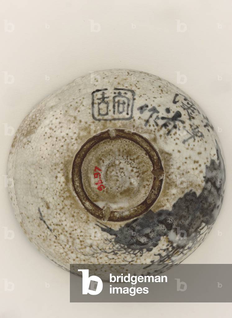 Kenzan style tea bowl with design of mountain retreat, late 19th century (stoneware with iron pigment under opaque glaze)