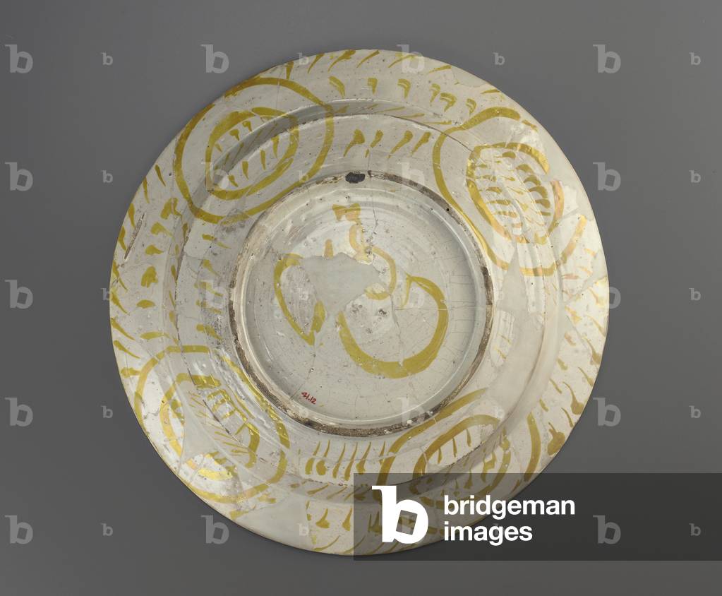 Plate (earthenware painted over glaze with lustre)