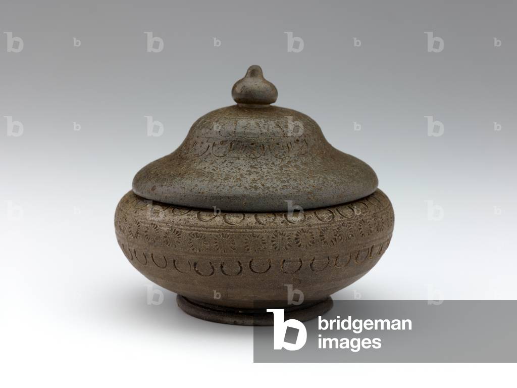 Cinerary urn with impressed decoration, late 7th century (unglazed stoneware with kiln gloss)