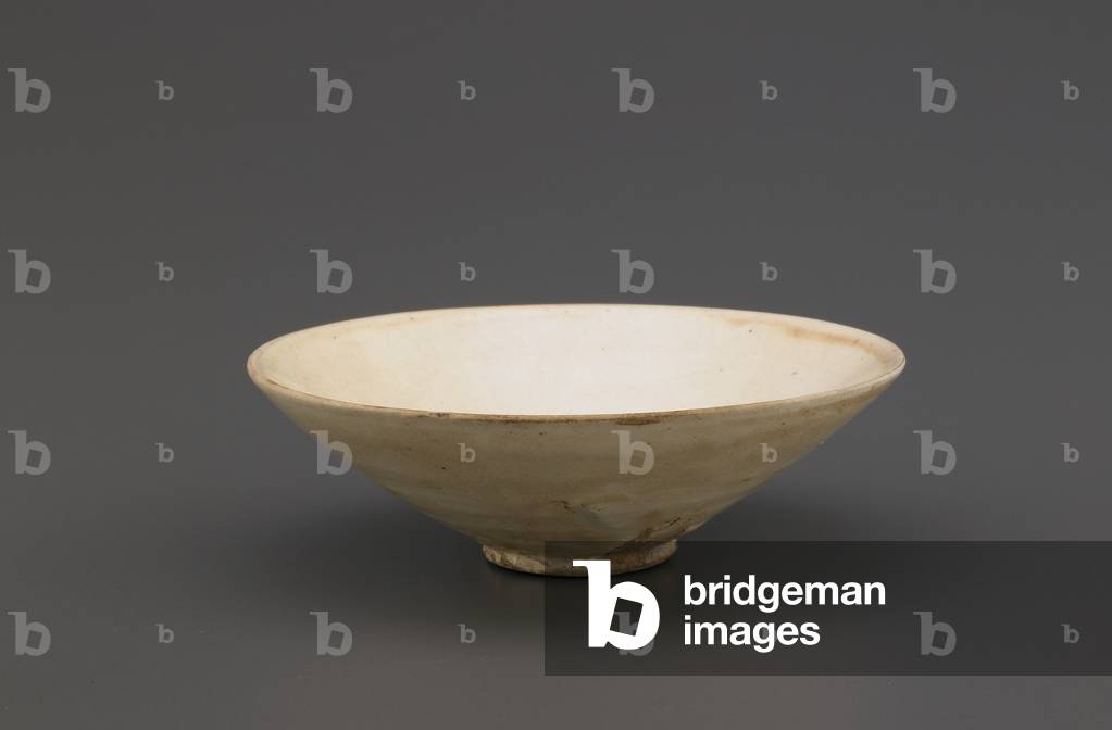 Bowl of Cizhou type ware, 11th-early 12th century (stoneware with white slip under clear, colourless glaze)