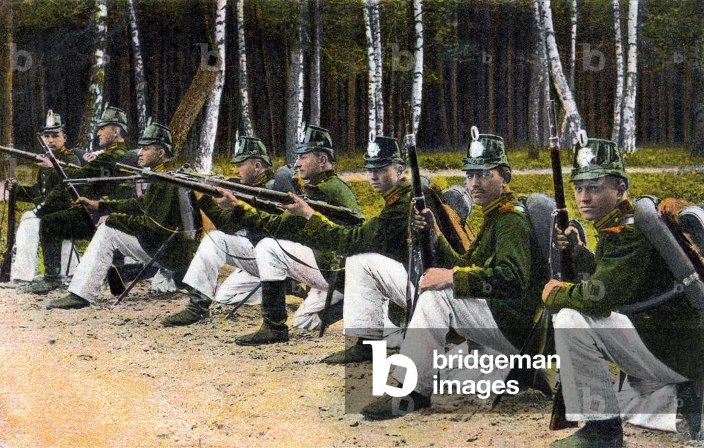 Eight soldiers of the Prussian Landwehr with 98 rifles at a shooting range next to a forest, Germany, 1915 (colour litho)