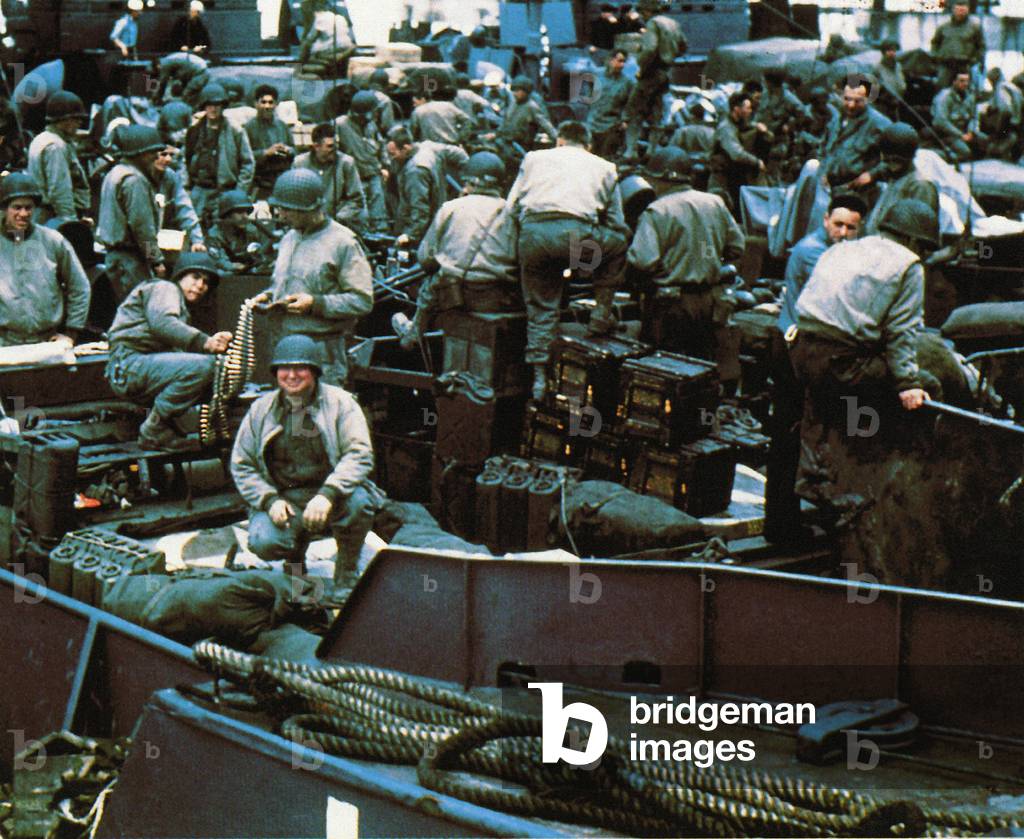 Equipment and troops have been loaded into a Landing Craft Tank (LCT) in Southern England, 5th June 1944 (photo)