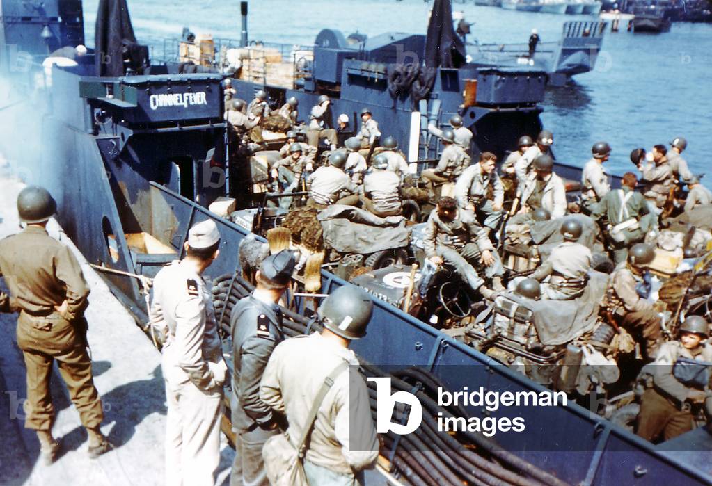 Soldiers of the 1st Infantry Division of the United States Army board the Landing Craft Transport 'Channel Fever' in Southern England, June 1944 (photo)