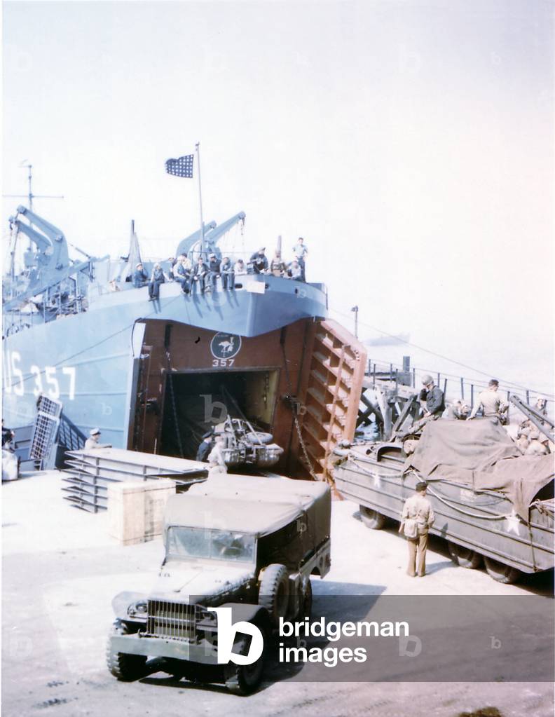Landing Ship Tank (LST 357) loading vehicles in preparation for the invasion of Normandy, Southern England, June 1944 (photo)