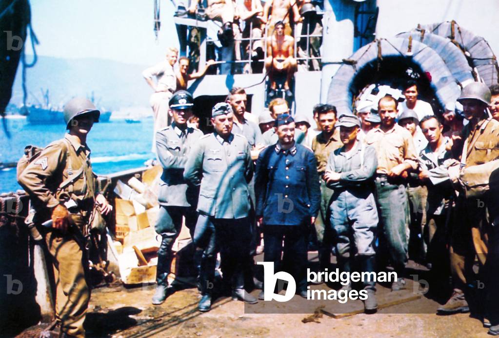 American troops with German prisoners of war on board a Landing Craft Transport (LCT), June 1944 (photo)