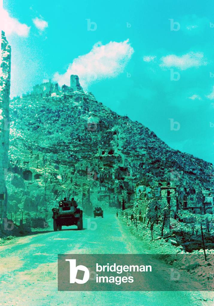 British soldiers driving along the road below Monte Cassino with US Sherman tanks, Italy, 20th May 1945 (photo)