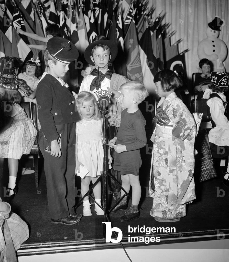 CHRISTMAS BROADCAST, 1938 Children of foreign diplomats participating in the Annual International Children's Christmas Program staged by the National Broadcasting Corporation. Photograph by Harris & Ewing, December 1938.
