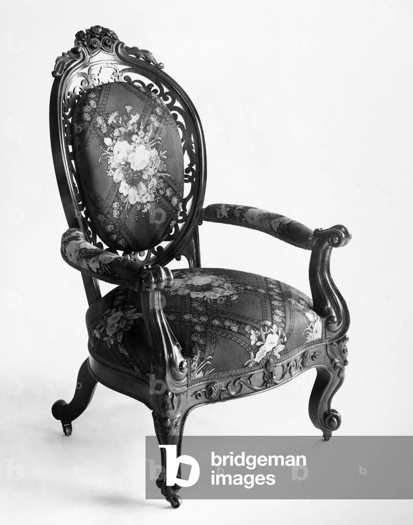 VICTORIAN ARM CHAIR, c.1860 American 'gentleman's chair,' rosewood in the Victorian Rococo style, by John Henry Belter (1804-1863), New York.
