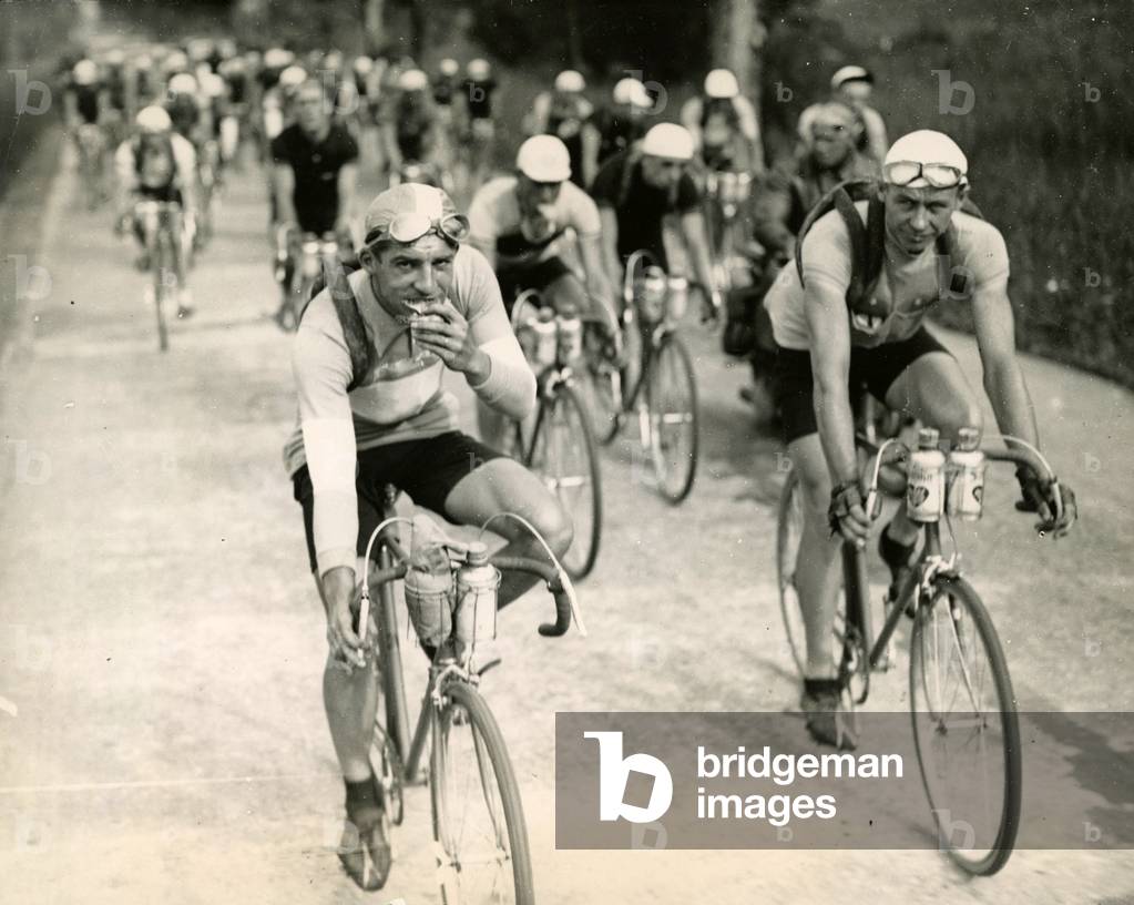 Tour de France cyclist 1936 Stage Aix les Bains Grenoble Before the climb of Galibier the riders comfort themselves