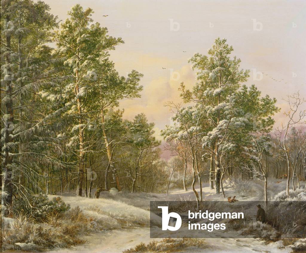 Sportivi in una foresta invernale