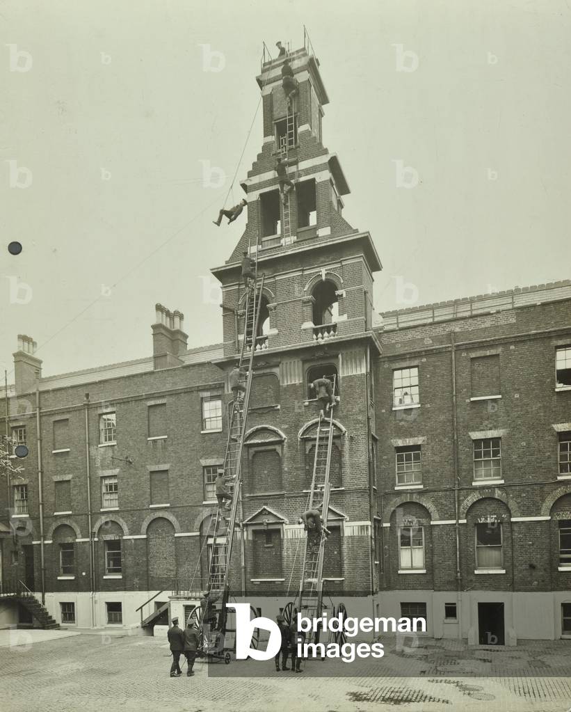London Fire Brigade Headquarters: life saving drill, 1920 (b/w photo)