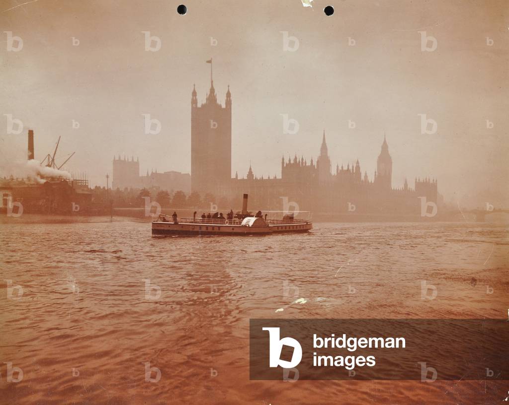 A steamboat in front of the Houses of Parliament, 1905 (b/w photo)