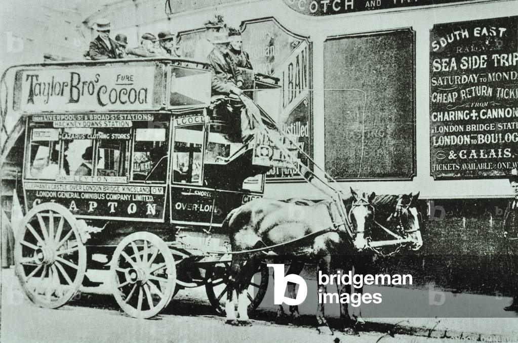 Horse-drawn omnibus with passengers, 1899 (b/w photo)