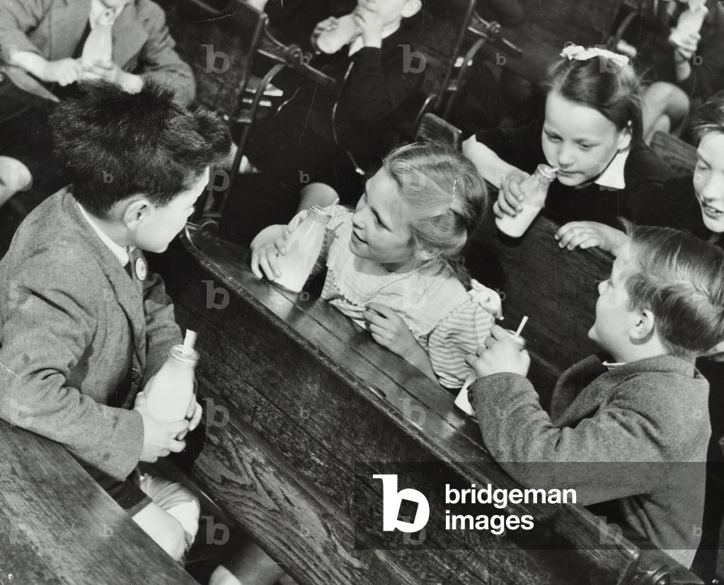 Schoolchildren drinking milk, 1952 (b/w photo)