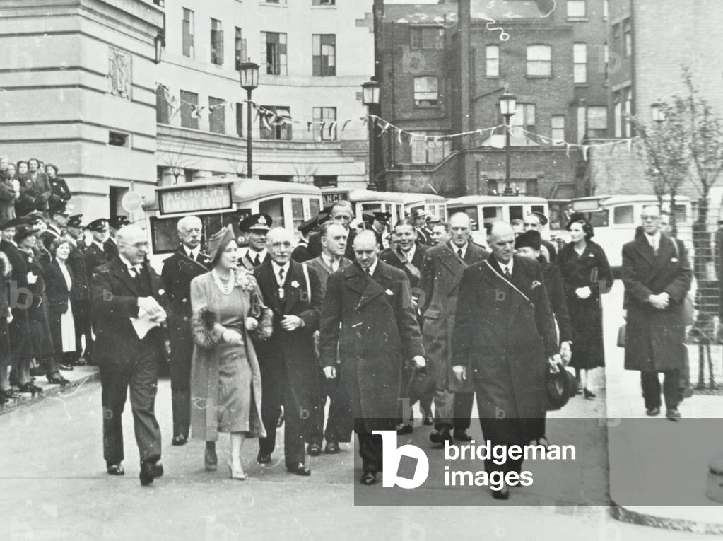 The Queen Mother inspecting London Ambulance Service at County Hall, 1941 (b/w photo)