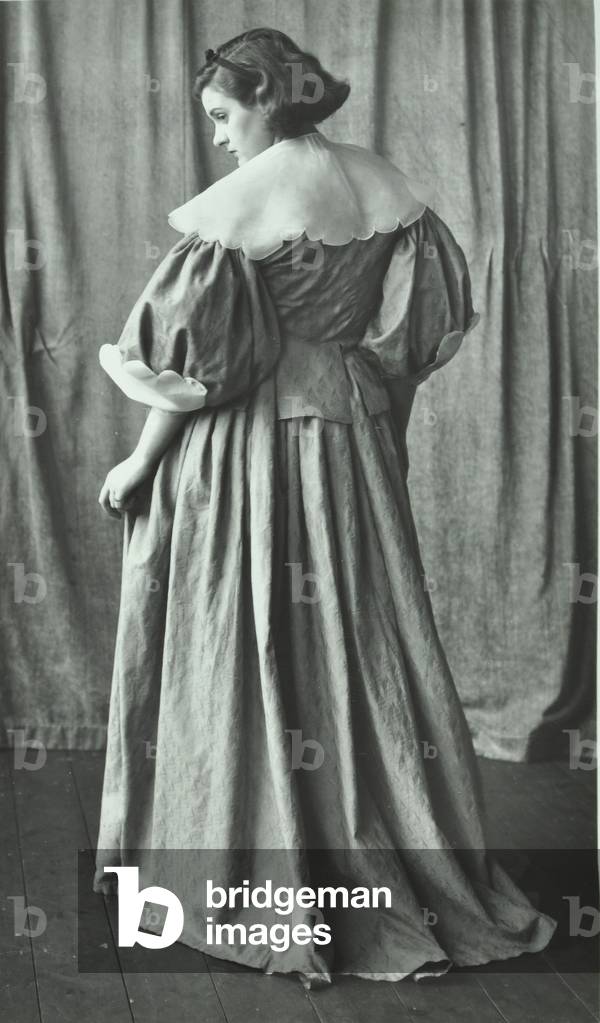 Hammersmith School of Arts and Crafts: A model wearing a period dress, 1937 (b/w photo)