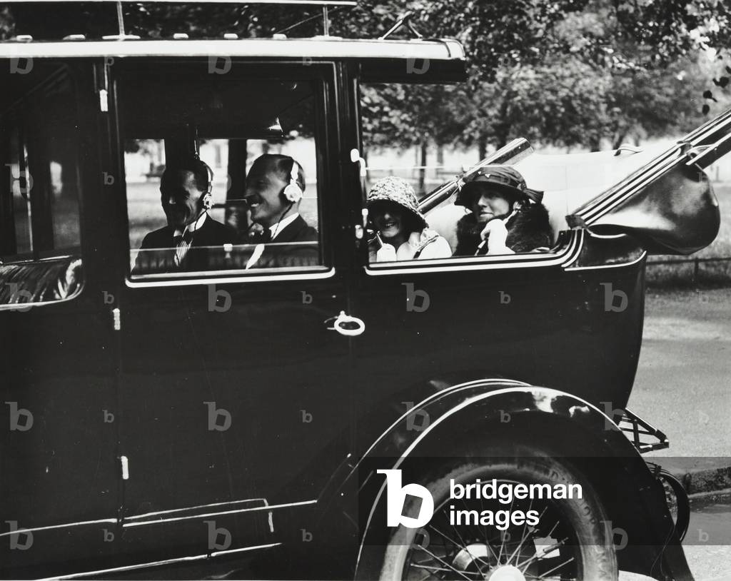 Early car radio being demonstrated, 1923 (b/w photo)