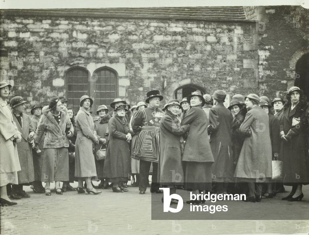 Tower of London, Tower Hill: sightseers and Beefeaters, 1929 (b/w photo)